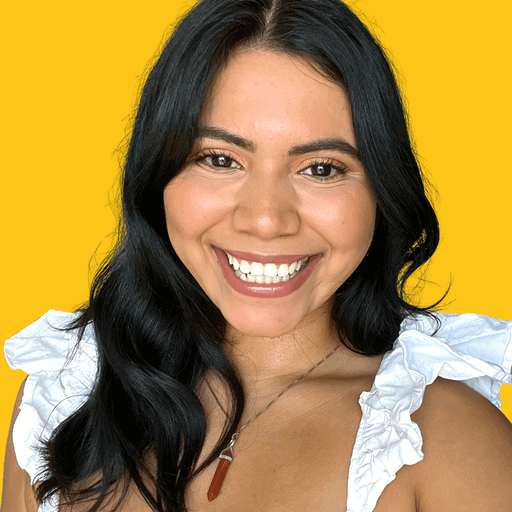Claudia's headshot against a yellow background