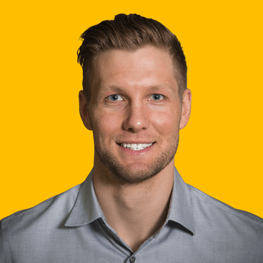 Jordan Bauer headshot against a yellow background
